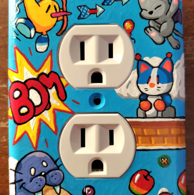 A painted NewZealand Story wall outlet